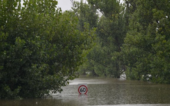 A general view of a main road under floodwaters in Richmond suburb on March 22, 2021, as Sydney braced for its worst flooding in decades after record rainfall caused its largest dam to overflow.