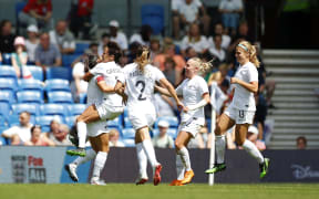Sarah Gregorius of New Zealand celebrates scoring against England.