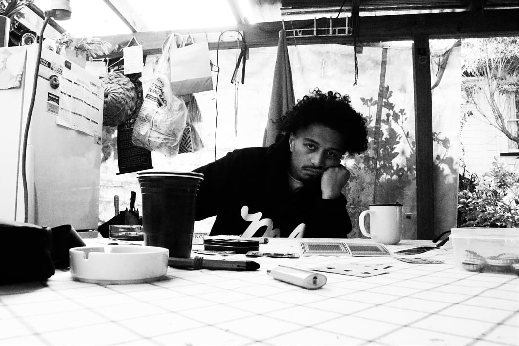 Diggy Dupé at home with a cup of tea.