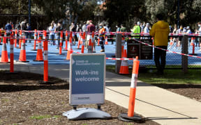 People queue at a Covid-19 vaccination centre in Melbourne on 1 September, 2021.