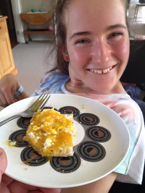 Grace Yeats enjoying eggs on toast
