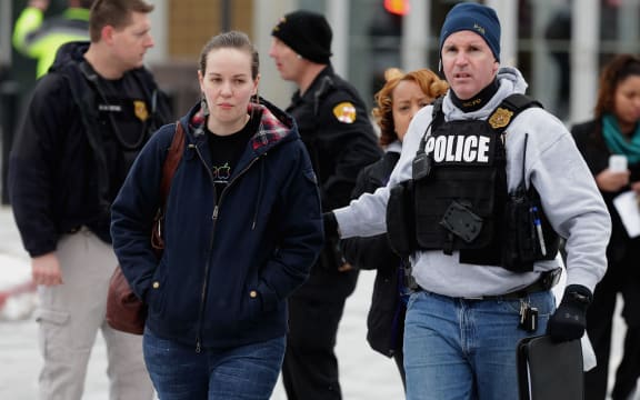 Police evacuate employees and shoppers from the mall.