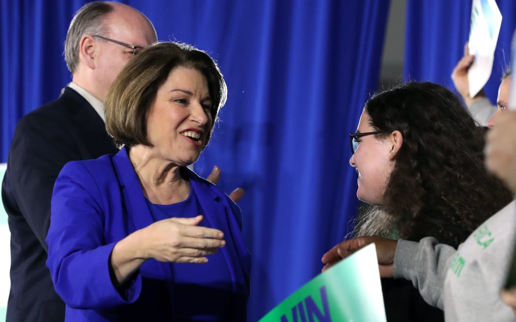 CONCORD, NEW HAMPSHIRE - FEBRUARY 11: Democratic presidential candidate Sen. Amy Klobuchar (D-MN) greets supporters as she takes the stage during a primary night event at the Grappone Conference Center on February 11, 2020 in Concord, New Hampshire.