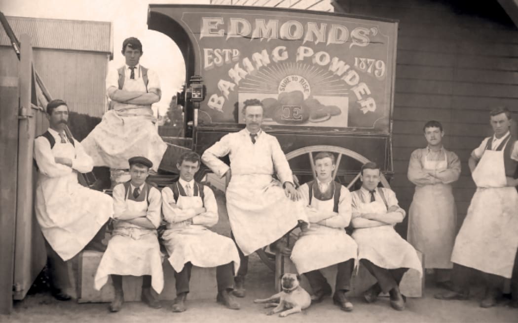 Thomas (centre) poses proudly with his staff. By 1902 his four sons were working for him: Ernest is seated at the back, with James and Will seated below him, and George is standing far right. Jim Knight is on the far left.