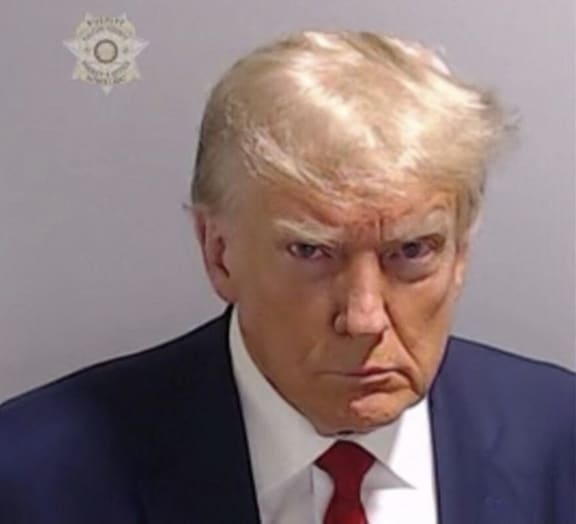 This handout image released by the Fulton County Sheriff's Office on August 24, 2023 shows the booking photo of former US President Donald Trump. Former US president Donald Trump was photographed for a police mug shot after his arrest on August 24 at the Fulton County Jail in Georgia, multiple US media outlets reported citing local officials.