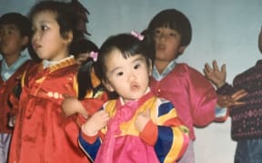 Maria Mo: "I was 2 here. Reppin’ my hanbok at the Sunday school Christmas show at church. I like to think this was my peak."