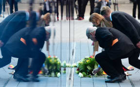 Visitors lay wreaths and flowers at the Berline memorial for the victims of Nazi euthanasia.