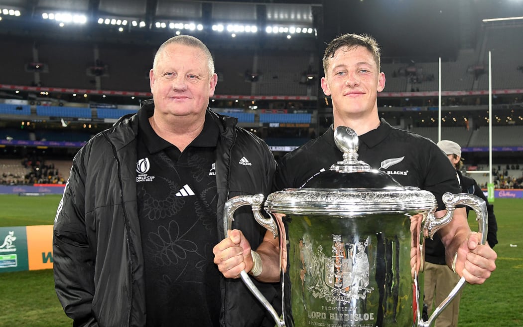 All Blacks Cam Roigard seen posing with the Bledisloe Cup with his father during the Rugby Championship between Wallabies and All Blacks at the Melbourne Cricket Ground (MCG) in Melbourne, Australia. Saturday 29 July 2023. Copyright Photo: Raghavan Venugopal / www.photosport.nz