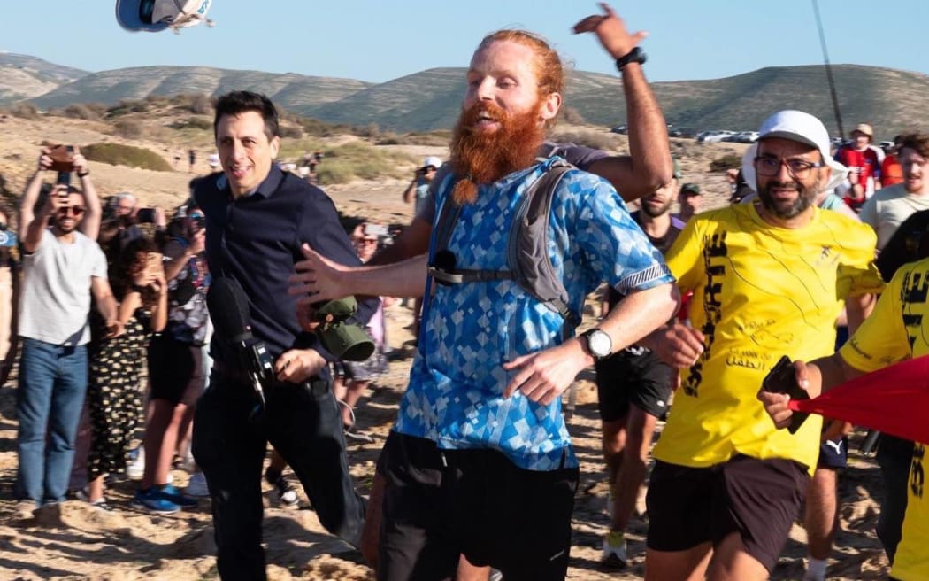 Russell Cook, aka the 'Hardest Geezer', completes his epic run.