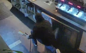 This person was caught on a security camera breaking into Crave in Auckland's Morningside.