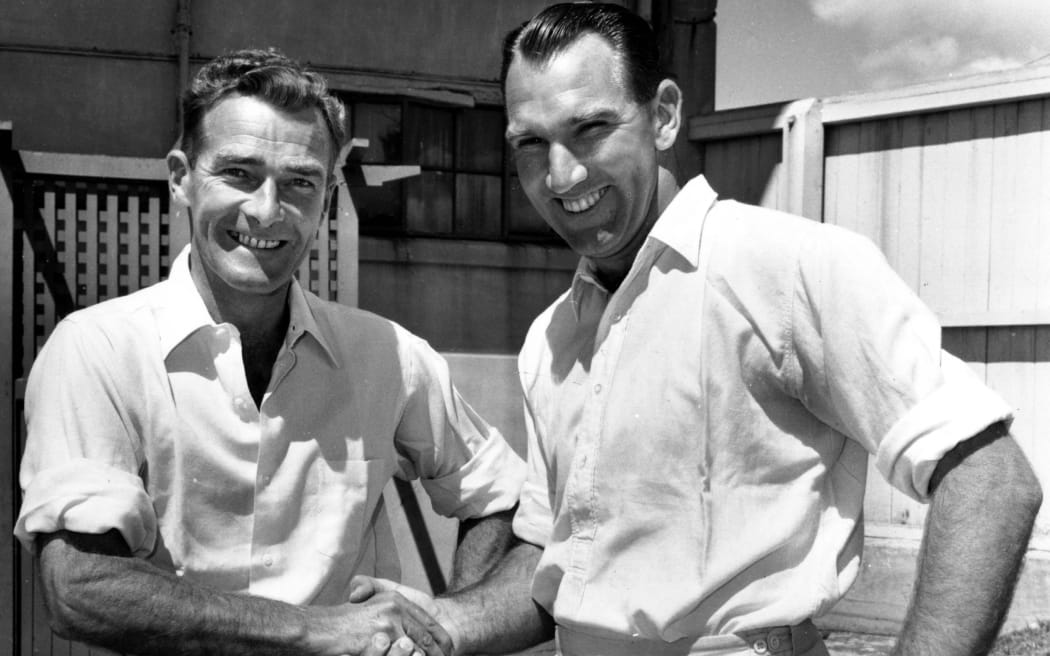 New Zealand cricket players Bert Sutcliffe (l) and John Reid (r) shake hands at the Plunket Shield Cricket competition, 1959.