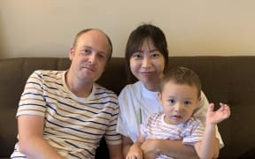 New Zealander Michael Hemmingsen with wife Mariko and son Aki.