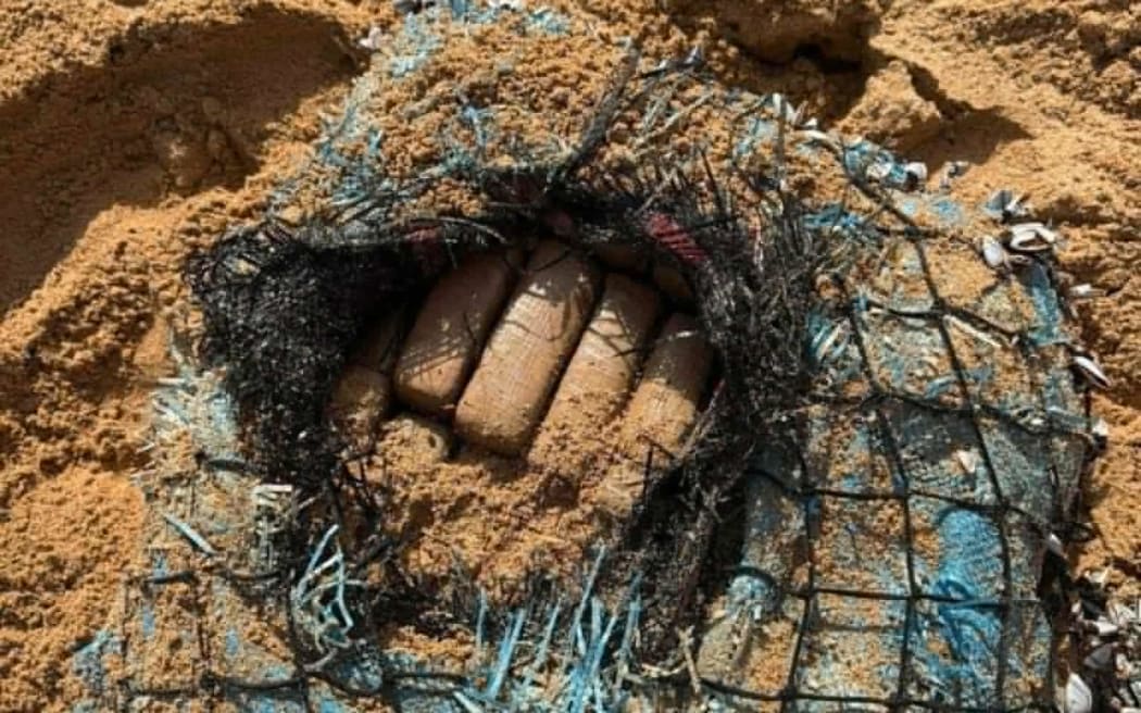A package with barnacles growing on it, believed to hold about 40 kilograms worth of cocaine, has washed up on a Norfolk Island beach