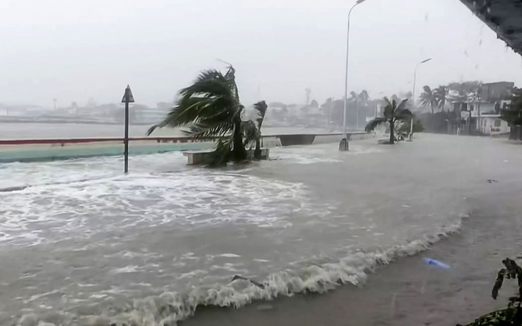 Storm surges sending waves hurtling over streets of Virac along the coast of Catanduanes island, as super typhoon Fung-wong approaches the Philippines.