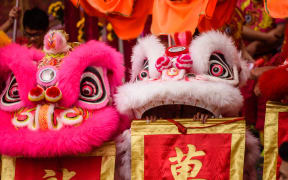Performers in Hong Kong marking the Year of the Rooster. 31 January 2017.