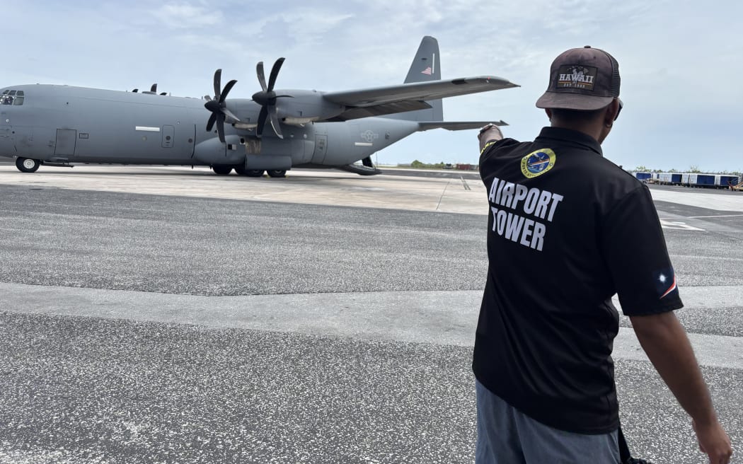 Demonstrating the ramped up focus on deportations under the Trump administration, US Immigration and Customs Enforcement used a military plane for the first time ever in June to deliver 18 Marshallese deported from the US to Majuro. Photo: Office of National Security, Marshall Islands.