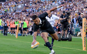 Reiko Ioane scores against the Wallabies.