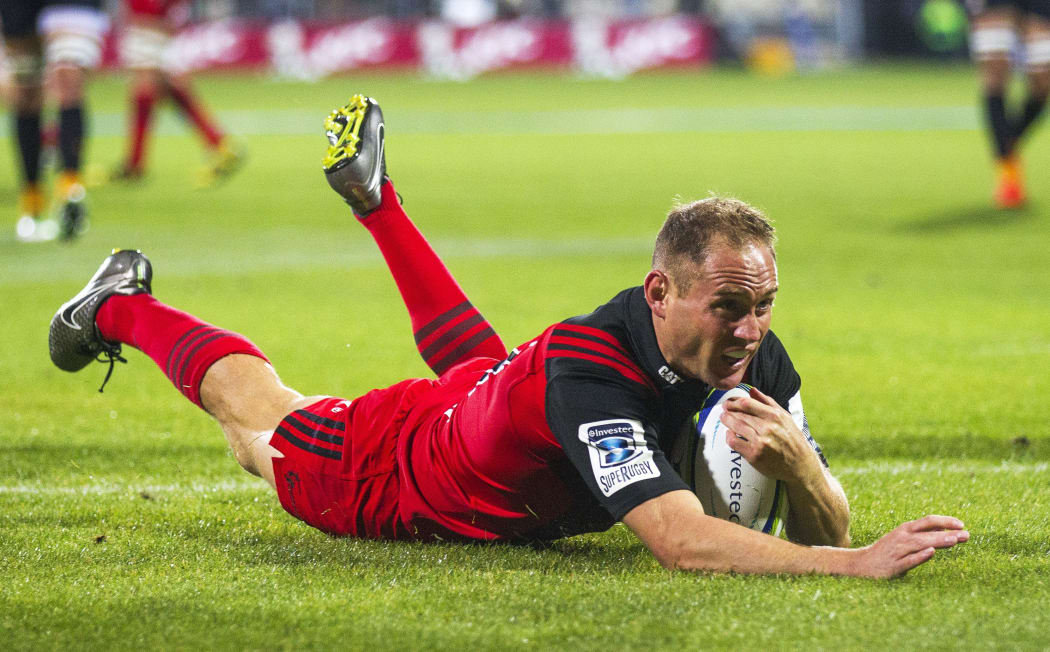 Crusaders halfback Andy Ellis.