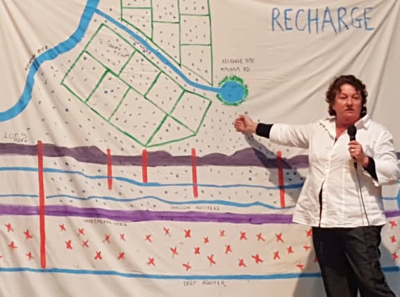 A group opposing the sale of water rights in Ashburton say it will meet with the council to discuss it concerns, and may take legal action to stop the sale.