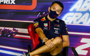 Red Bull's Thai driver Alex Albon speaks during the presser ahead of the Abu Dhabi Formula One Grand Prix at the Yas Marina Circuit in the Emirati city of Abu Dhabi on December 10, 2020.