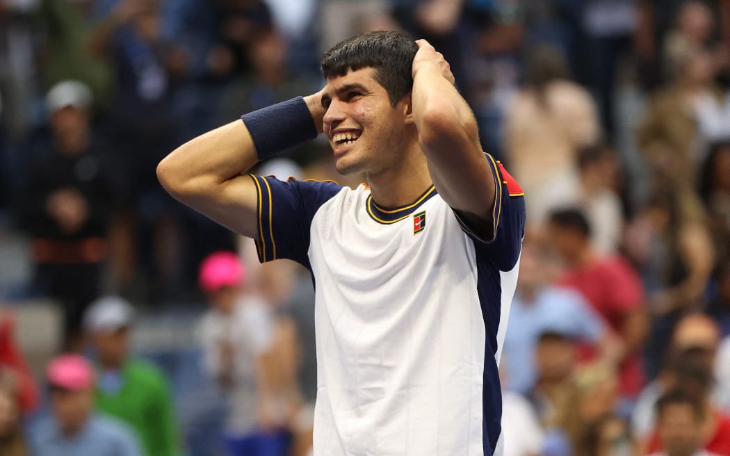 Carlos Alcaraz of Spain celebrates after defeating Stefanos Tsitsipas of Greece during his Men's Singles third round match on Day Five at USTA Billie Jean King National Tennis Center on September 03, 2021 in New York City.