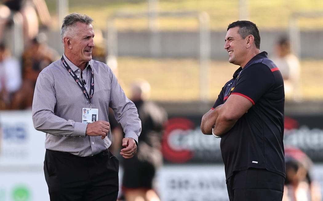 Rob Penney coach of the Crusaders and Clayton McMillan head coach of the Chiefs during the Super Rugby Pacific rugby match between the Chiefs and the Crusaders at FMG Stadium in Hamilton, New Zealand on Friday February 23, 2024. Copyright photo: Aaron Gillions / www.photosport.nz