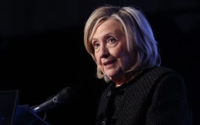 Former US Secretary of State Hillary Clinton speaks on stage as she attends the The World Forum 2026 on February 16, 2026.