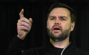 US Vice President JD Vance speaks at the US military's Pituffik Space Base in Greenland on March 28, 2025. The visit is viewed by Copenhagen and Nuuk as a provocation amid President Donald Trump's bid to annex the strategically-placed, resource-rich Danish territory. (Photo by Jim WATSON / POOL / AFP)