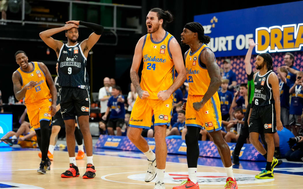 Brisbane Bullets centre Tyrell Harrison celebrates during their win over the New Zealand Breakers.
