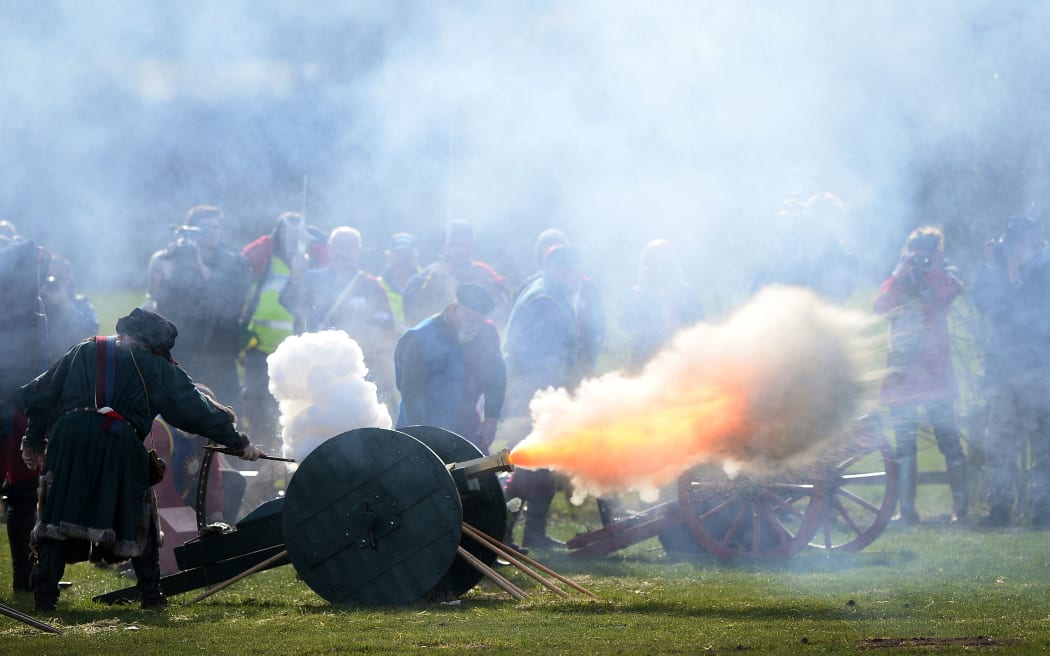Members of a re-enactment group perform a 21 gun salute during a ceremony for King Richard III.