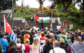 Hundreds of people gathered outside Parliament's steps to call on the government to demand an immediate and permanent ceasefire in Gaza on 5 December, 2023.