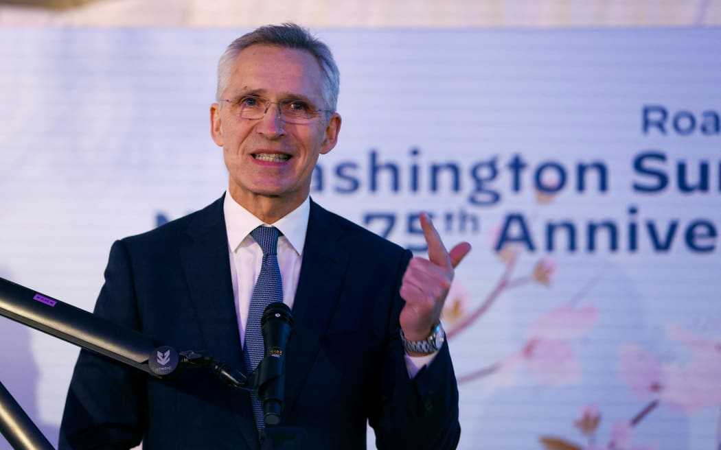 NATO Secretary General Jens Stoltenberg delivers a speech during a ceremony marking the 75th anniversary of the signing of the North Atlantic Treaty, implementing the North Atlantic Treaty Organization (NATO) military alliance, in Brussels, on April 3, 2024. (Photo by Johanna Geron / POOL / AFP)