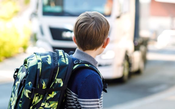 Child near a truck