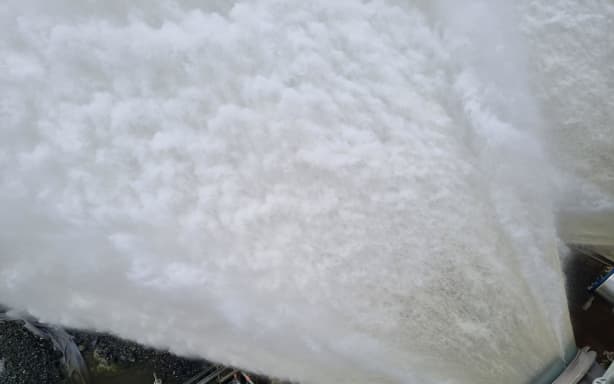 Water being discharged from a release valve at the Waimea Community Dam.