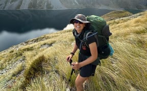Cyclist Kate Wightman on the Waiau Pass while walking the length of NZ to raise funding & awareness for gynaecological cancer