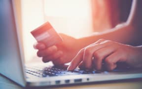 Credit card at computer