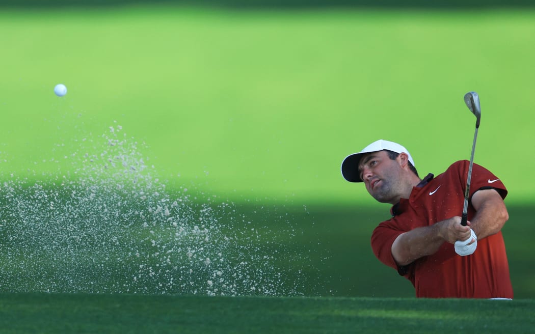 CHARLOTTE, NORTH CAROLINA - MAY 15: Scottie Scheffler of the United States hits his third shot on the 10th hole during the first round of the PGA Championship at Quail Hollow Country Club on May 15, 2025 in Charlotte, North Carolina. (Photo by David Cannon/Getty Images) (Photo by DAVID CANNON / David Cannon Collection / Getty Images via AFP)