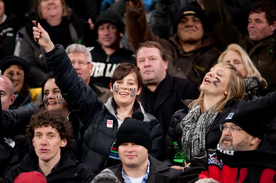 All Blacks fans revel after an All Blacks try against South Africa at the then-Westpac Stadium, in 2011.