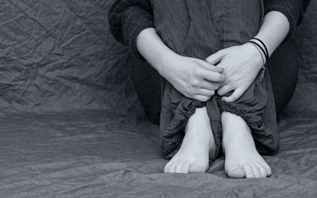 Person sitting on floor