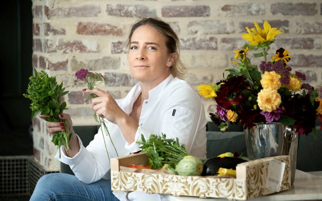 Amandine Chaignot, one of the three chefs who will cook for the athletes during the Olympics games, poses during a photo session in Paris on August 5, 2023.