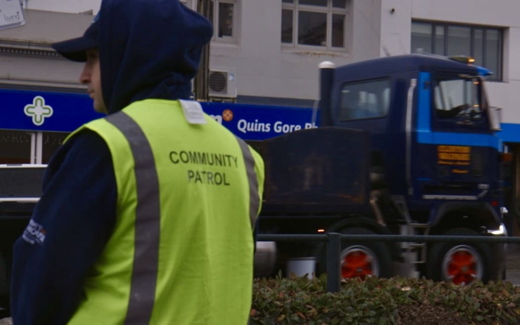Community Patrol keeps the roads safe while the parade drives through.