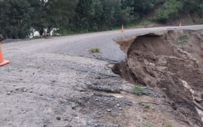 Damage on Waihau Road, where it is acting as a dam against a small lake in Dartmoor near Napier.