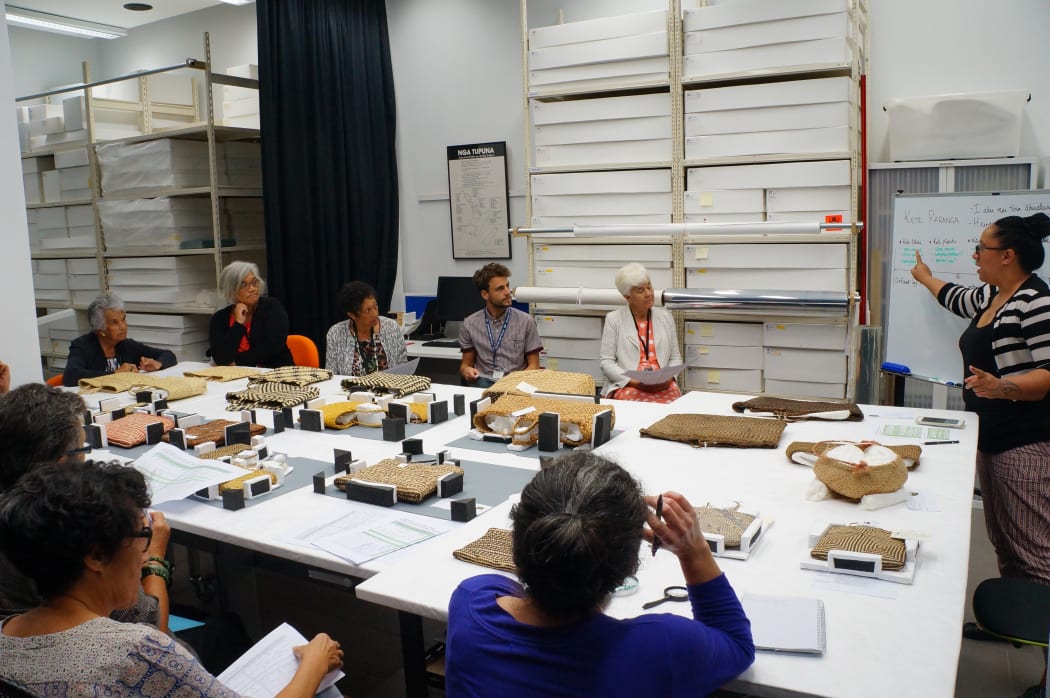 Taumata Māreikura members in wananga (discussion) with Te Awe team to consider correct terminology for various kete (baskets) types.