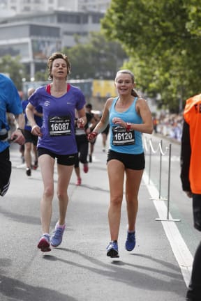 Melissa Moon guiding blind runner, Maria Williams in a half marathon in Wellington