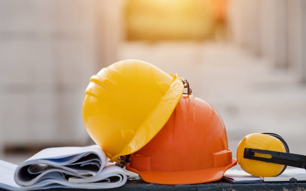Close-up helmet in the construction site