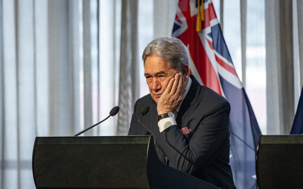 Coalition agreement signing ceremony between Christopher Luxon, David Seymour and Winston Peters.