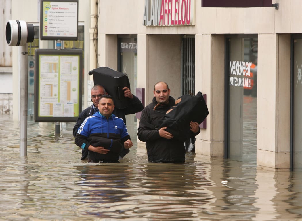 Floodwaters in Nemours, southeast of Paris, forced thousands out of their homes.