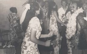 Aunty Nane teaches Michael Somare traditional Cook Islands 'ura' dance in 1971.