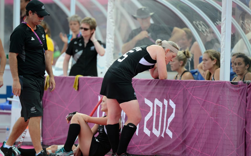 Coach Mark Hager and Katie Glynn show their dissappointment after losing the Bronze Medal Womens Hockey match 3-1. New Zealand v Great Britain at Riverbank Arena, Olympic Games, London. United Kingdom. Friday 10 August 2012. Photo: Andrew Cornaga / Photosport.co.nz