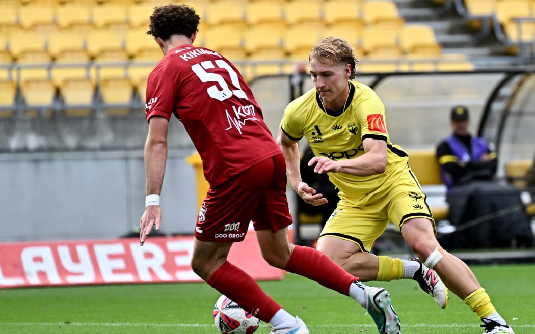 Corbin Piper of the Phoenix and Panagiotis Kikianis of Adelaide compete for the ball during the A-League Men - Wellington Phoenix v Adelaide United at Sky Stadium, Wellington, New Zealand on Saturday 11 January 2025.                                                                    
Copyright photo: Masanori Udagawa /  www.photosport.nz